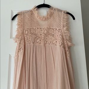 Blush sleeveless dress with high neck